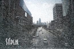 Stadsgezicht door gebarsten glas - Sale